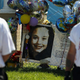 Members of the Guardian Angels stand outside the home of kidnap victim Gina DeJesus. (Matt Sullivan/Getty Images)